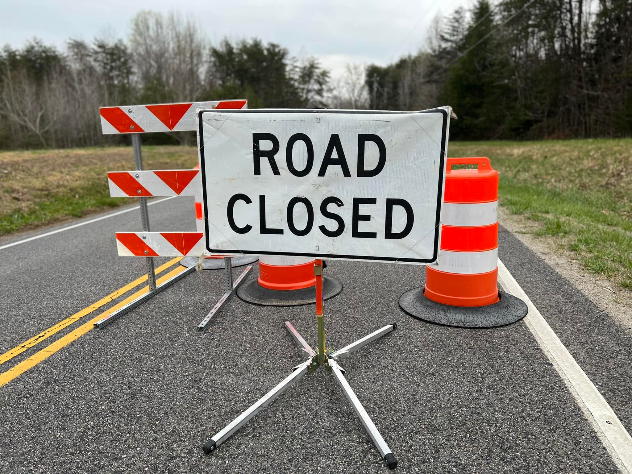 Road Closed Signs and Barrel