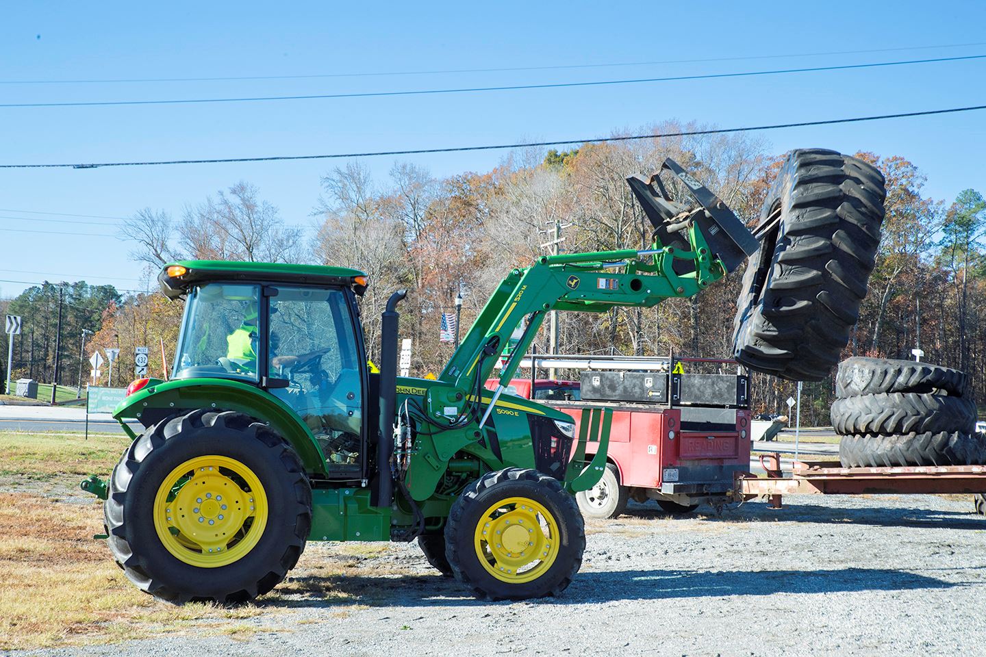 Tire Amnesty - Tractor moving tire